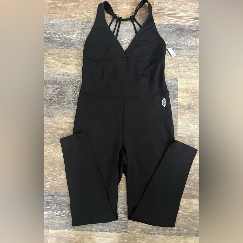 NWT Free people movement jumpsuit size large